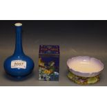 A Royal Worcester floral trinket dish; a Carlton Ware bottle vase;