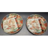 A pair of Japanese shaped circular plates,