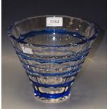 An Art Glass conical vase, of facetted form, banded in blue, 16cm high,