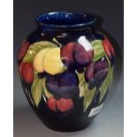 A large Moorcroft Wisteria pattern ovoid vase, tube lined with large flowerheads and foliage,