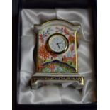 A Royal Crown Derby Haiku pattern miniature mantel clock,