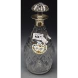 A cut glass decanter with silver collar, Birmingham 1979,