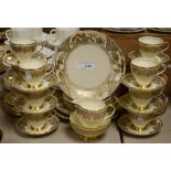 Foley and Noritake part tea service, gilded decoration on yellow ground,