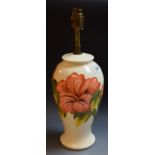A contemporary Moorcroft Hibiscus pattern ovoid table lamp,