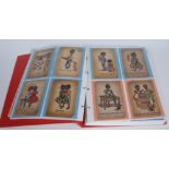 Postcards - Black Memorabilia - Thirty-seven coloured postcards, various manufactures,