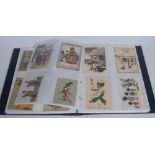 Postcards - Black Memorabilia - Forty-two coloured postcards, various manufactures,