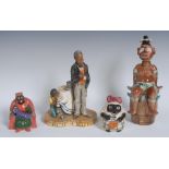 A Nautrecraft figural group, Little Scamp, the mischievous hides from his angry elder, 23cm high,