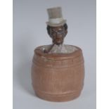 An early 20th century Continental bisque porcelain novelty tobacco jar, as a black gentleman,