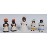A pair of mid 20th century novelty condiments, moulded with as a black lady and gentleman,