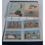 Postcards - Black Memorabilia - Forty coloured postcards, various manufactures,