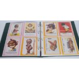 Postcards - Black Memorabilia - Forty-two coloured postcards, various manufactures,