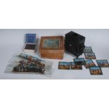 A German Magic Lantern, boxed; a set of eight Primus Junior Lecturers Series Coloured Slides,