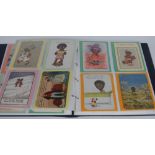 Postcards - Black Memorabilia - Thirty-two coloured postcards, various manufactures,