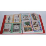 Postcards - Black Memorabilia - Thirty-two coloured postcards, various manufactures,