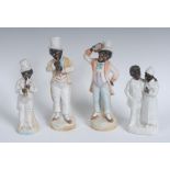 A late 19th century German bisque porcelain figure, modelled as a negro musician,