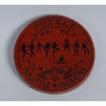 A late 19th/early 20th century tin puzzle, Ten Little N**ger Boys,