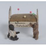 Sewing - an early 20th century cold painted spelter novelty pin cushion,