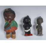 An early 20th century black rubber toy, by Compex, England, of a Bovver Baby,