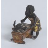 An Austrian cold painted bronze, of a young black mother, perturbed, her baby refusing to sleep, 3.