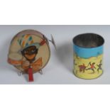 An early 20th century child's novelty tinplate toy drum kit,