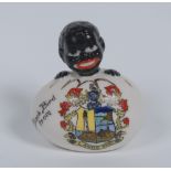 An Arcadian China Crested Ware egg, with hatching black boy, inscribed A Black Bird From,