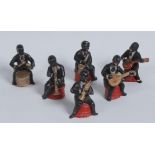 A set of six early to mid 20th century slip-cast models, of Jazz musicians,