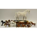 A Royal Doulton Desert Orchid model; a Royal Doulton matt black Foal model;