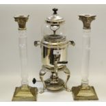 A pair of glass and plated Corinthian column candlesticks;