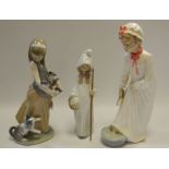 A Lladro figure of a Girl with Cat and Kittens; a Nao figure,