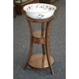 A Georgian circular washstand, central drawer,