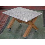 A contemporary marble top coffee table, x-frame base. 53cm high x 82cm long x 66cm wide.