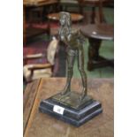 Erotica - a bronzed figure of BDSM lady