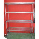 A commercial aluminum moveable four tier shelving unit by Craven Hygienic Storage and Handling.