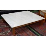 A large modern marble topped coffee table. 35cm high x 152.5cm long x 123cm wide.