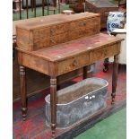 A George III mahogany writing table, four short drawers to the superstructure,