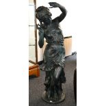 A green patinated cast metal figure of a classical maiden. 160cm high.