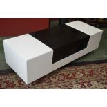 A modern designer low lounge unit. 46cm high x 160cm long x 58cm wide.