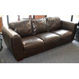 A contemporary three seater dark brown leather sofa