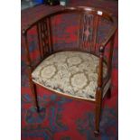 An Edwardian mahogany inlaid tub chair, curved toprail, pierced splats, stuffed overseat,