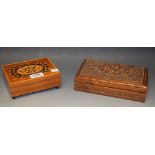 A carved wood playing card box;