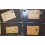 Stamps - GB and commonwealth postal stationery in an album