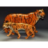 A pair of Beswick models, of a tiger and tigress,