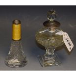 A silver and yellow guilloche mounted cut glass scent bottle, London hallmarks; another,