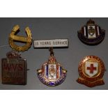 A WVS Civil Defence badge; a Red Cross badge; etc.