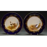 A pair of Royal Worcester plates, Partridge and Pheasant,