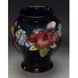 A Moorcroft Orchid pattern baluster vase,