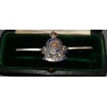 A Royal Army Ordnance Corps silver and enamel brooch,