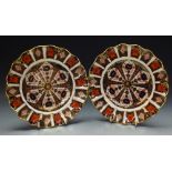 A pair of Royal Crown Derby Imari 1128 shaped circular plates,