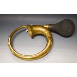 A brass car horn