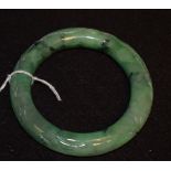 A Chinese style carved jade bangle